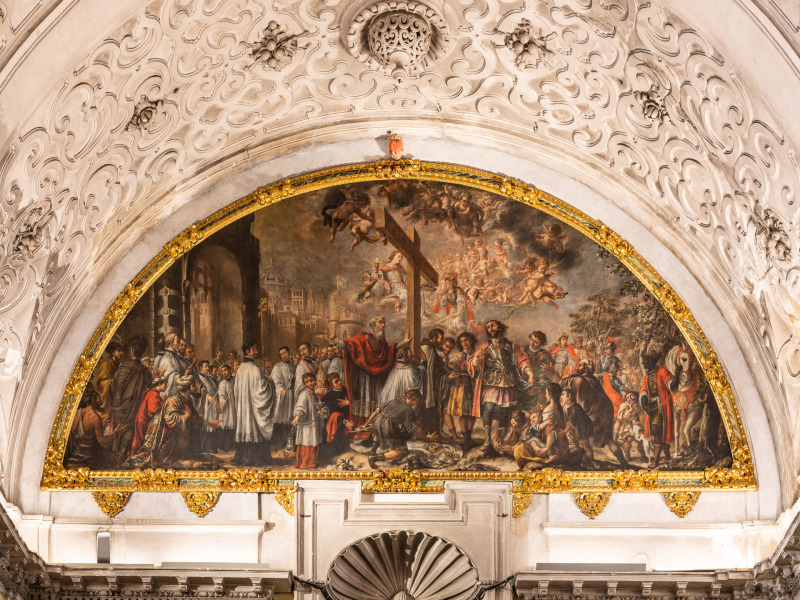 The Baroque-style church of the Hospital de la Santa Caridad (Capilla de San Jorge) was promoted by Miguel Mañara in Seville, Spain and completed in 1670.The interior decoration of the church was programmed by Miguel Mañara and artists such as Murillo, Valdés Leal, Pedro Roldán and Bernardo Simón de Pineda took part in it. Here we see the entrance and the choir of the church and above them, The Triumph of the Holy Cross, by Valdés Leal (1684-1685), oil on canvas.