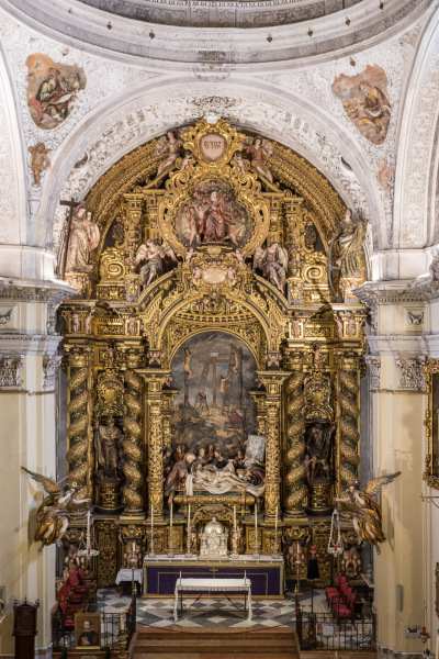 The Baroque-style church of Hospital de la Santa Caridad (Capilla de San Jorge) in Seville (Spain) completed in 1670., view from the chorusThe interior decoration of the church was programmed by Miguel Mañara and artists such as Murillo, Valdés Leal, Pedro Roldán and Bernardo Simón de Pineda took part in it. The high altarpiece of the Charity shows the relief of Christ’s descent (Valdés Leal) and the sculpture group (Pedro Roldán), while the altarpiece was made by Bernardo Simón de Pineda