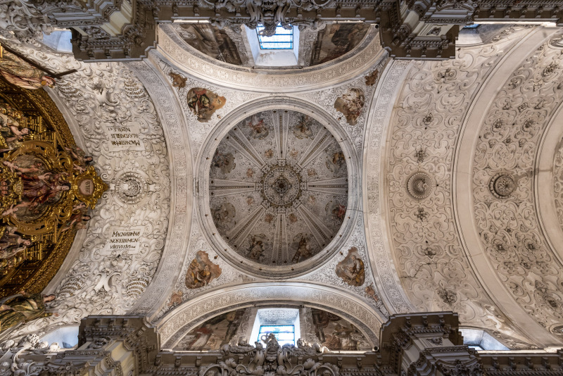 The Baroque-style church of Hospital de la Santa Caridad (Capilla de San Jorge) was promoted by Miguel de Mañara in Seville, Spain and completed in 1670.The church is a single nave with a barrel vault decorated with plasterwork with abstract shapes and a slightly oval dome. The entire upper part of the church is covered with tempera paintings made by Valdés Leal between 1678 and 1682.